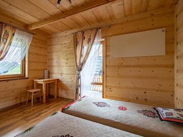 Фото номера Дом для отпуска Дома для отпуска Góralska Osada г. Баньска 30